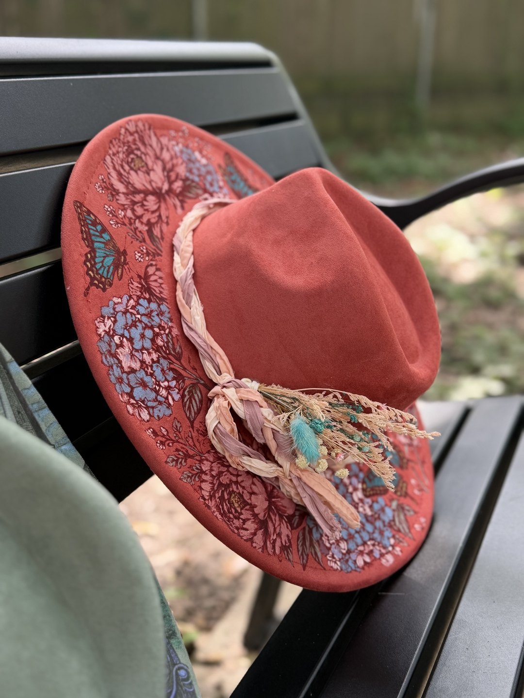 Terracotta hand-painted hat brim with blue hydrangeas and butterflies