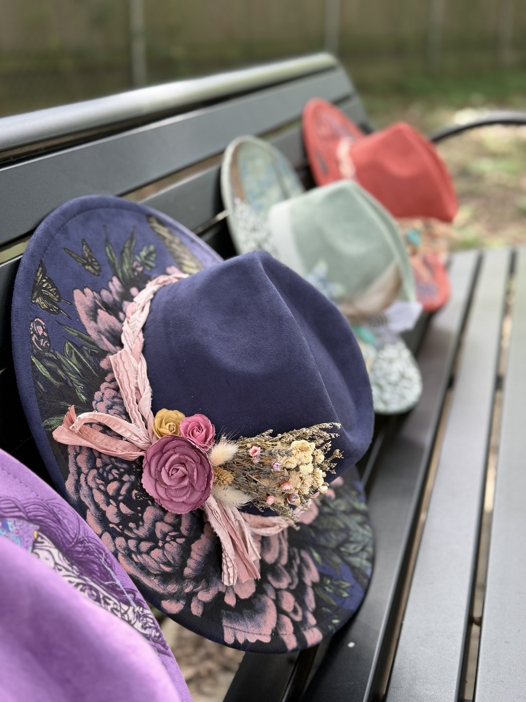 Navy blue hand-painted hat brim with pink peonies and butterflies