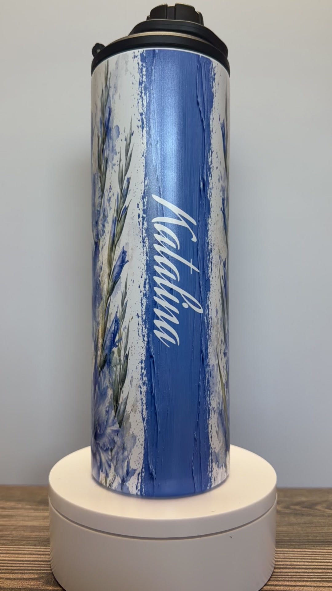 Personalized blue floral tumbler with the name Katalina