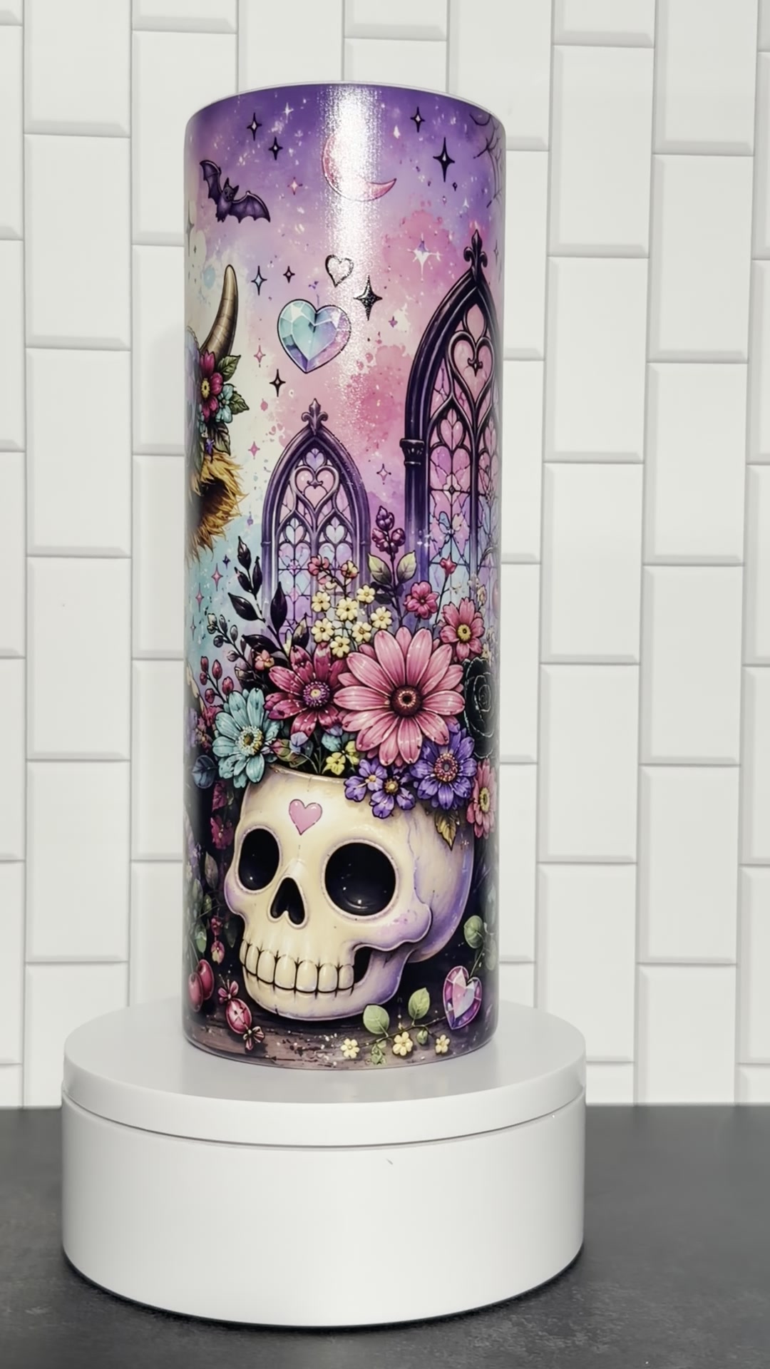 Custom UV-printed tumbler with a pastel floral skull design